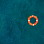 Top view of lifebuoy in the sea. Life ring floating in a sea.